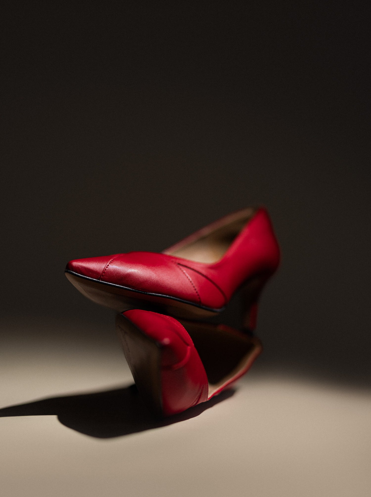 Vegan and sustainable red high-heeled shoes.