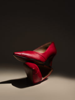 Vegan and sustainable red high-heeled shoes.